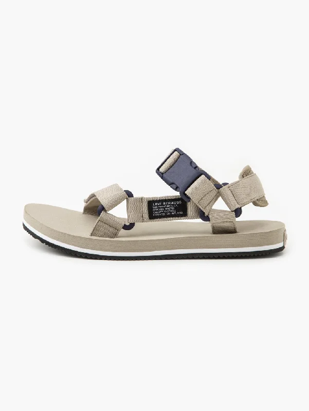 Men's sandals in a neutral color like black or brownMen's Beige Solid Sandals