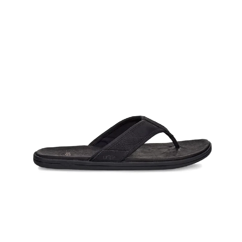 Men's sandals with a buckle closureUGG® - Men's Seaside Leather Flip Flop Sandals (1102690-BLK)