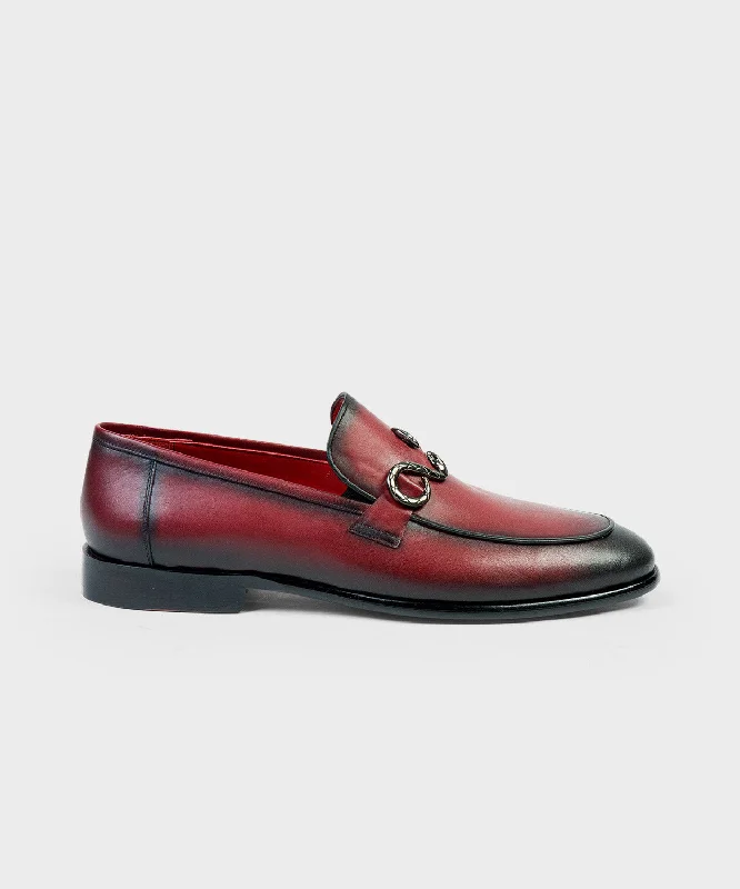 Men's loafers with a moc - toe designSnake Detail Loafers