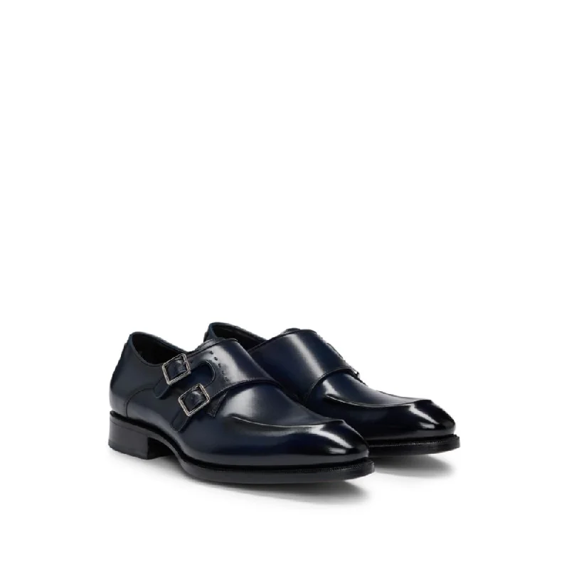 Men's formal shoes with a decorative perforationDouble-strap monk shoes in leather with heel detail